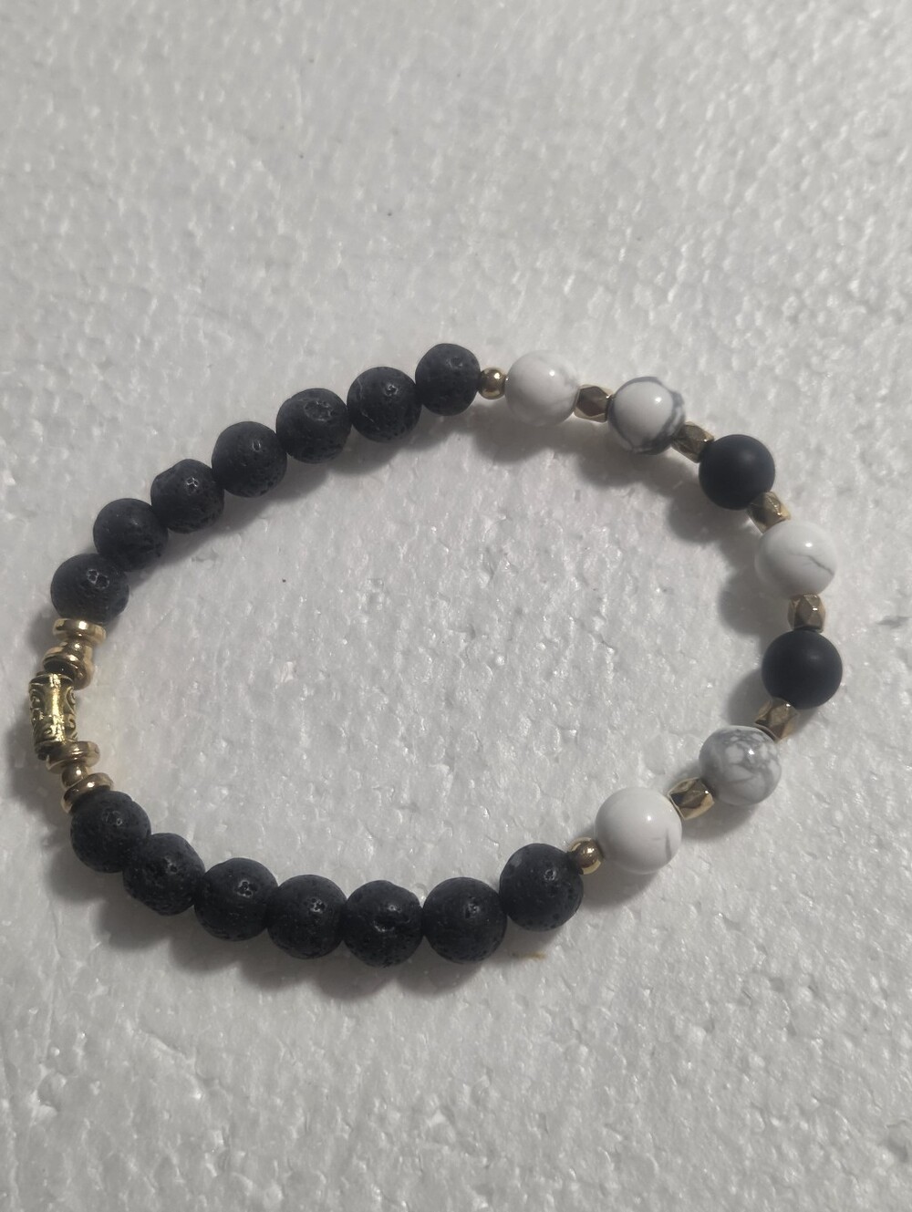 Handcrafted Black and White Beaded Stretch Bracelet with Gold Accents